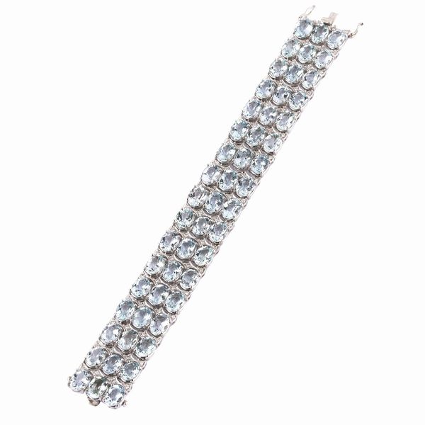 BRACCIALE A FASCIA CON ACQUAMARINE E DIAMANTI  - Asta GIOIELLI - Associazione Nazionale - Case d'Asta italiane