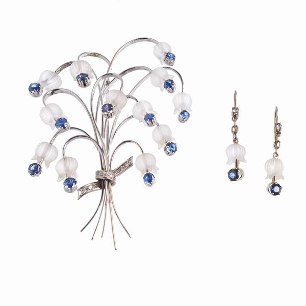 DEMI PARURE FLOREALE CON CRISTALLO DI ROCCA ZAFFIRI E DIAMANTI  - Asta GIOIELLI - Associazione Nazionale - Case d'Asta italiane