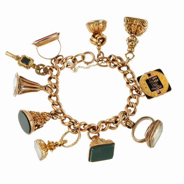 BRACCIALE A CATENA CON CHARMS  - Asta GIOIELLI - Associazione Nazionale - Case d'Asta italiane