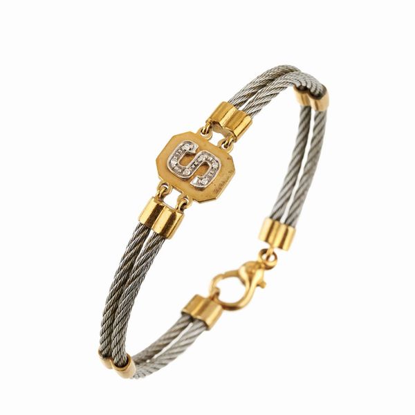 BRACCIALE SEMIRIGIDO CON INIZIALE  - Asta GIOIELLI - Associazione Nazionale - Case d'Asta italiane