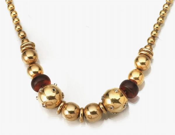 Collana in oro giallo, ambra e diamanti  - Asta VINTAGE: BORSE E ACCESSORI DI HERMES, LOUIS VUITTON E ALTRE GRANDI MAISON - Associazione Nazionale - Case d'Asta italiane