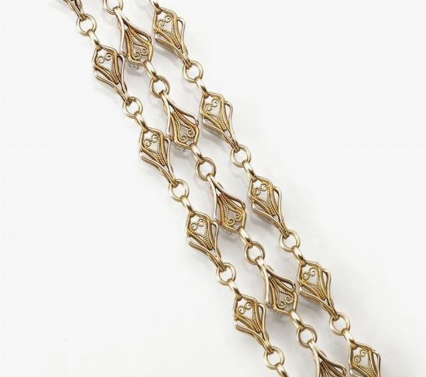 Lunga catena in oro giallo  - Asta VINTAGE: BORSE E ACCESSORI DI HERMES, LOUIS VUITTON E ALTRE GRANDI MAISON - Associazione Nazionale - Case d'Asta italiane