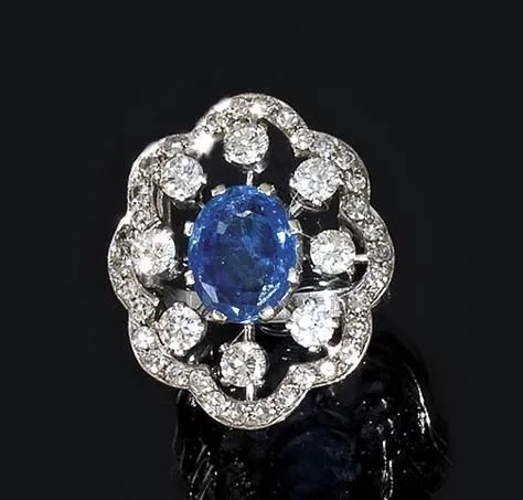 Anello in oro bianco, zaffiro e diamanti  - Asta VINTAGE: BORSE E ACCESSORI DI HERMES, LOUIS VUITTON E ALTRE GRANDI MAISON - Associazione Nazionale - Case d'Asta italiane