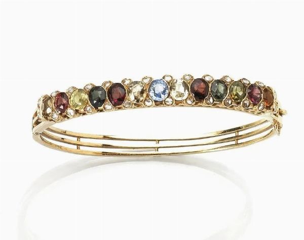 Bracciale in oro giallo e pietre di colore  - Asta VINTAGE: BORSE E ACCESSORI DI HERMES, LOUIS VUITTON E ALTRE GRANDI MAISON - Associazione Nazionale - Case d'Asta italiane