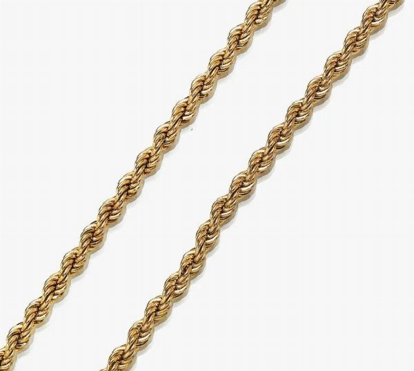 Catena in oro giallo e medaglione con miniatura  - Asta VINTAGE: BORSE E ACCESSORI DI HERMES, LOUIS VUITTON E ALTRE GRANDI MAISON - Associazione Nazionale - Case d'Asta italiane