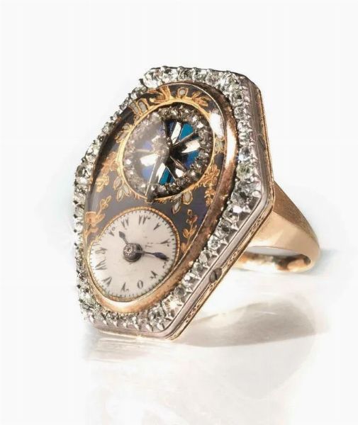 RARO ANELLO OROLOGIO PER IL MERCATO TURCO, 1800 CIRCA, IN ORO GIALLO SMALTO E DIAMANTI  - Asta VINTAGE: BORSE E ACCESSORI DI HERMES, LOUIS VUITTON E ALTRE GRANDI MAISON - Associazione Nazionale - Case d'Asta italiane