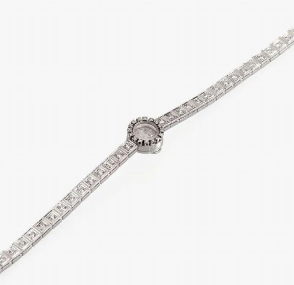 BRACCIALE-OROLOGIO JAEGER LE COULTRE, ANNI '60, CASSA N. 775'731, IN ORO BIANCO E DIAMANTI  - Asta VINTAGE: BORSE E ACCESSORI DI HERMES, LOUIS VUITTON E ALTRE GRANDI MAISON - Associazione Nazionale - Case d'Asta italiane