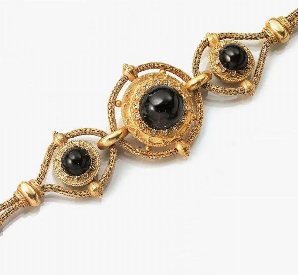 Bracciale, fine sec. XIX,&nbsp; in oro giallo, granati e diamanti  - Asta VINTAGE: BORSE E ACCESSORI DI HERMES, LOUIS VUITTON E ALTRE GRANDI MAISON - Associazione Nazionale - Case d'Asta italiane