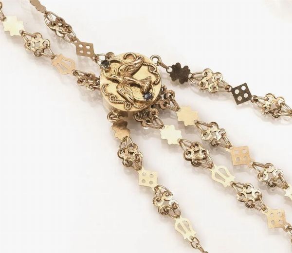 Saliscendi in oro a basso titolo  - Asta VINTAGE: BORSE E ACCESSORI DI HERMES, LOUIS VUITTON E ALTRE GRANDI MAISON - Associazione Nazionale - Case d'Asta italiane