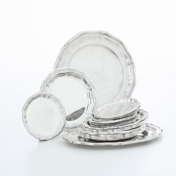 Insieme di sottobicchieri e due sottobottiglia. Argenteria italiana del XX secolo  - Asta Argenti e Icone - Associazione Nazionale - Case d'Asta italiane