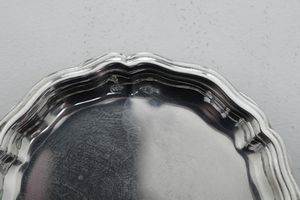 Insieme di sottobicchieri e due sottobottiglia. Argenteria italiana del XX secolo  - Asta Argenti e Icone - Associazione Nazionale - Case d'Asta italiane