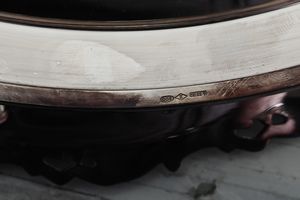 Ciotola tonda e centrotavola con piedini. Varie argenterie italiane del XX secolo  - Asta Argenti e Icone - Associazione Nazionale - Case d'Asta italiane