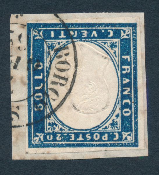 1855 - Sardegna - 20 cent. cobalto oltremare scuro, II tavola, tiratura del 1861 (Sass. 15Di) su piccolissimo frammento annullato con parte di Cerchio Borgo S. Donnino 7 gennaio 1862.  - Asta Filatelia e Storia Postale - Associazione Nazionale - Case d'Asta italiane