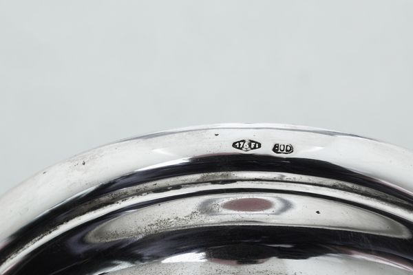 Coppia di candelieri a rocchetto. Argenteria artistica fiorentina del XX secolo, argentiere Pampaloni  - Asta Argenti da Collezione | XX secolo - Associazione Nazionale - Case d'Asta italiane