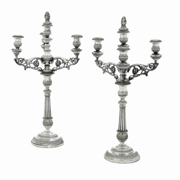 Coppia di candelabri. Vercelli XIX secolo, argentiere Giuseppe Sambonetti  - Asta Argenti da Collezione | Antichi - Associazione Nazionale - Case d'Asta italiane