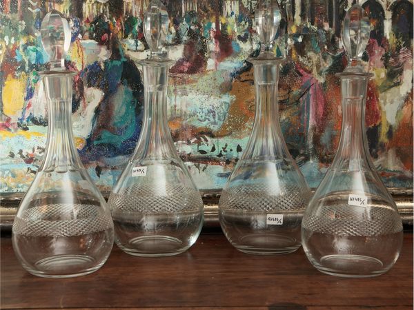Serie di quattro bottiglie da vino in cristallo molato  - Asta Dballage. Occasioni in asta - Associazione Nazionale - Case d'Asta italiane