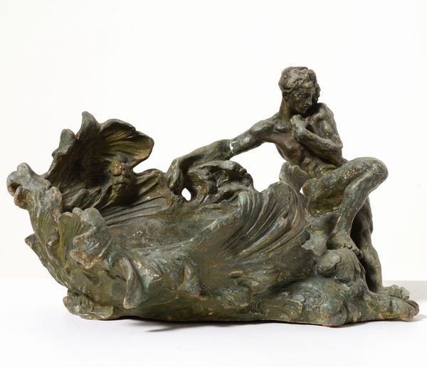 Centrotavola a foggia di foglie e figura femminile. XX secolo  - Asta Antiquariato - Associazione Nazionale - Case d'Asta italiane