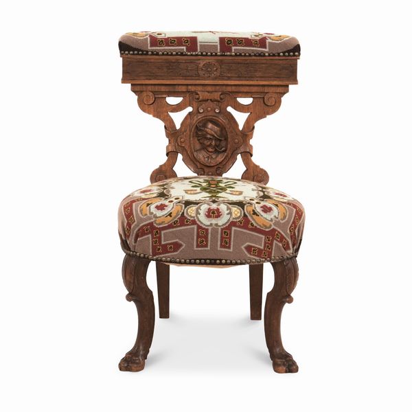 Poltrona in legno intagliato  - Asta Antiquariato - Associazione Nazionale - Case d'Asta italiane