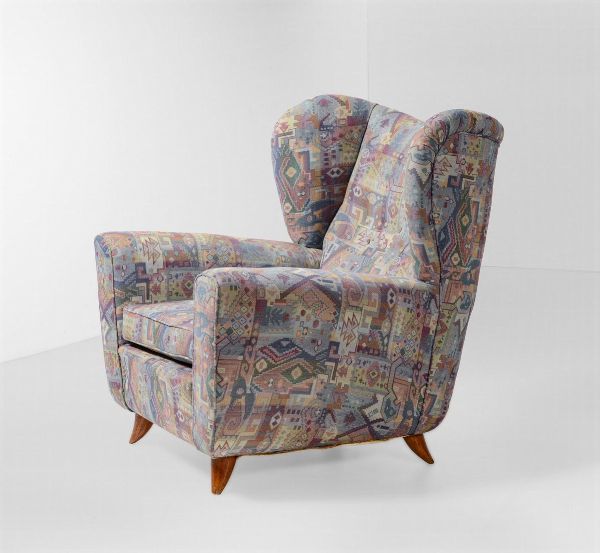 Poltrona con struttura in legno e rivestimenti in tessuto.  - Asta Antiquariato del XX secolo - Associazione Nazionale - Case d'Asta italiane