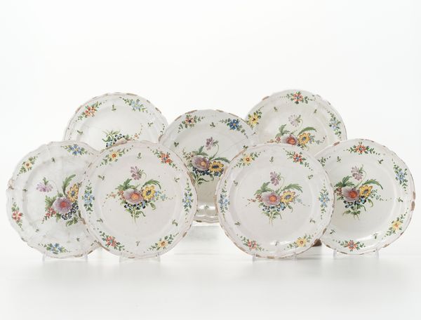 Sette piatti.<BR>Probabilmente Imola, Societ Cooperativa Ceramica, XX secolo.  - Asta Maioliche, Porcellane e Vetri - Associazione Nazionale - Case d'Asta italiane
