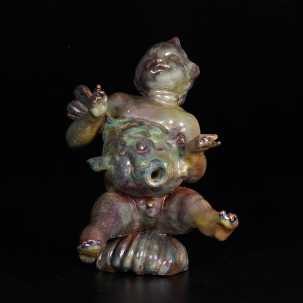 Figura di putto con pesce alla maniera di Melandri, XX secolo.  - Asta Maioliche, Porcellane e Vetri - Associazione Nazionale - Case d'Asta italiane