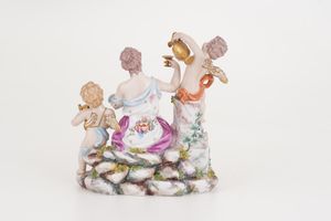 Gruppo allegorico.<BR>Probabilmente Napoli, XX secolo.  - Asta Maioliche, Porcellane e Vetri - Associazione Nazionale - Case d'Asta italiane