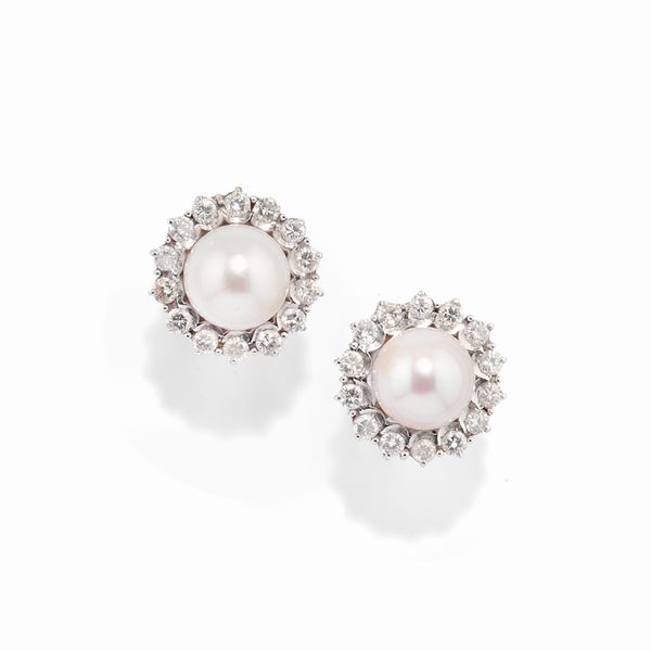 Coppia di orecchini e bracciale con diamanti  - Asta Gioielli - Associazione Nazionale - Case d'Asta italiane