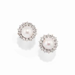 Coppia di orecchini e bracciale con diamanti  - Asta Gioielli - Associazione Nazionale - Case d'Asta italiane