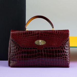 Borsa in coccodrillo bordeaux con autorizzazione Cites  - Asta Fashion Vintage - Associazione Nazionale - Case d'Asta italiane