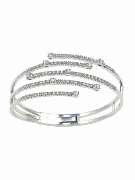 Damiani. Bracciale rigido Notte di San Lorenzo con diamanti  - Asta Gioielli - Associazione Nazionale - Case d'Asta italiane