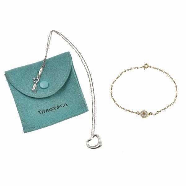 Lotto composto da pendente Open Heart Elsa Peretti, Tiffany&Co. ed un braccialetto Mer�  - Asta Gioielli - Associazione Nazionale - Case d'Asta italiane