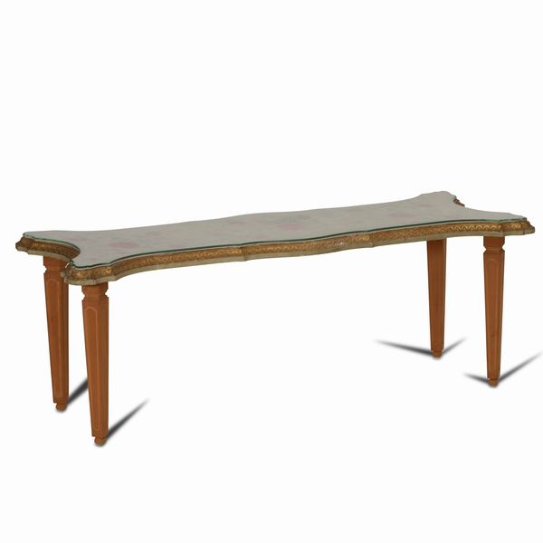 Tavolo in legno intagliato, dipinto e piano in vetro, XX secolo  - Asta Antiquariato - Associazione Nazionale - Case d'Asta italiane