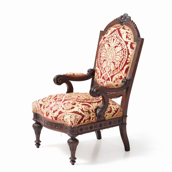 Poltrona in legno intagliato. XIX secolo  - Asta Antiquariato - Associazione Nazionale - Case d'Asta italiane