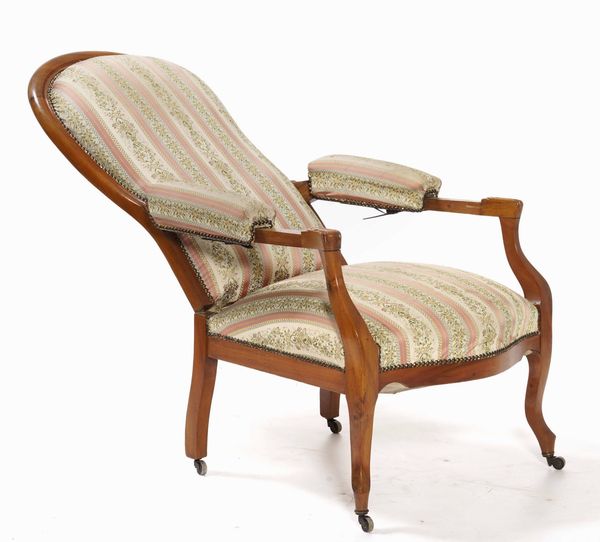 Poltrona con schienale reclinabile. XX secolo  - Asta Antiquariato - Associazione Nazionale - Case d'Asta italiane