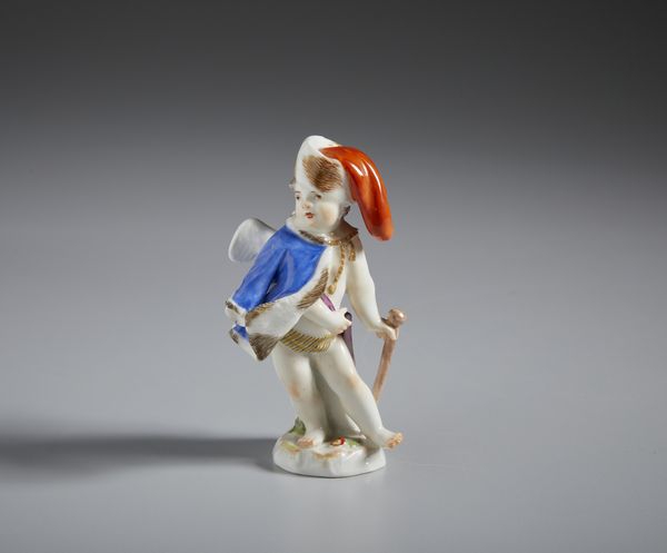 MANIFATTURA DI MEISSEN DEL XIX SECOLO : Cupido alato in porcellana policroma con cappello di pelliccia, mantello e bastone  - Asta Asta 502 | ARTE ANTICA E DEL XIX SECOLO Online - Associazione Nazionale - Case d'Asta italiane