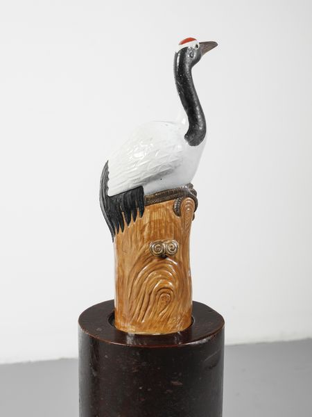 MANIFATTURA CINESE DEL XX SECOLO : Coppia di aironi in ceramica policroma e invetriata, assemblati su colonne in legno patinato di differente manifattura  - Asta Asta 502 | ARTE ANTICA E DEL XIX SECOLO Online - Associazione Nazionale - Case d'Asta italiane