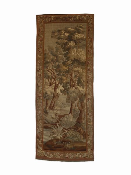 MANIFATTURA DI OUDENAARDE DEL XVIII SECOLO : Arazzo con paesaggio boschivo e specchio d'acqua entro cornice a motivi floreali e a volute  - Asta Asta 502 | ARTE ANTICA E DEL XIX SECOLO Online - Associazione Nazionale - Case d'Asta italiane