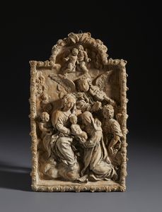 MANIFATTURA DELL'ITALIA MERIDIONALE DEL XVIII SECOLO - Rilievo in terracotta raffigurante la Vergine con il Bambino e Sant'Anna, tra angeli musicanti e cherubini