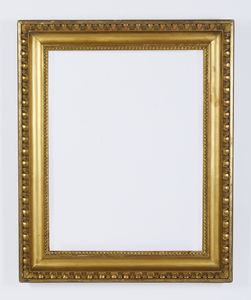 MANIFATTURA DEL XIX SECOLO - Cornice neoclassica in legno intagliato e dorato con decorazione a ovuli