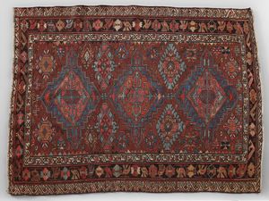 SUMAK - Tappeto con trama, ordito e vello in lana di inizio XX secolo, con classico disegno a medaglioni Konaghend, Caucaso