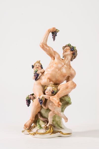 Coppia di sculture in porcellana policroma,  raffiguranti Bacco e Flora, secolo XX  - Asta Incanti d'Arte - Associazione Nazionale - Case d'Asta italiane
