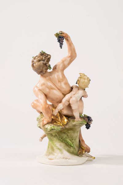Coppia di sculture in porcellana policroma,  raffiguranti Bacco e Flora, secolo XX  - Asta Incanti d'Arte - Associazione Nazionale - Case d'Asta italiane