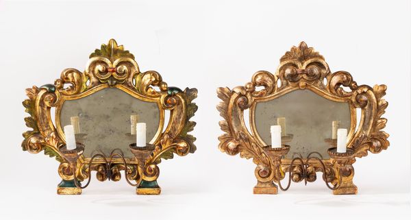 Coppia di cartaglorie in legno intagliato e dorato a volute fogliate  - Asta Incanti d'Arte - Associazione Nazionale - Case d'Asta italiane