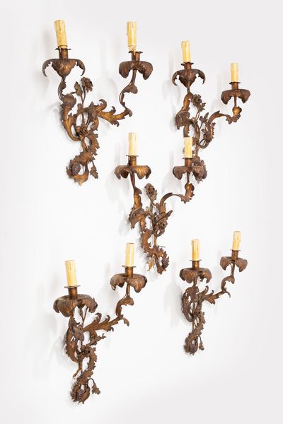 Cinque appliques a due luci in ferro battuto  - Asta Incanti d'Arte - Associazione Nazionale - Case d'Asta italiane