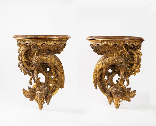 Coppia di consoles pensili in legno intagliato e dorato  - Asta Incanti d'Arte - Associazione Nazionale - Case d'Asta italiane