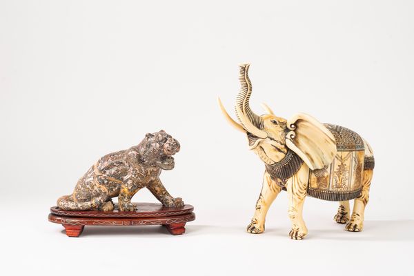 Lotto composto da una tigre in pietra dura ed un elefante in resina, secolo XX  - Asta Incanti d'Arte - Associazione Nazionale - Case d'Asta italiane