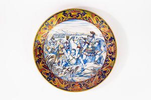 Due piatti da parata istoriati in maiolica policroma a lustro. Manifattura Mastro Giorgio, Gualdo Tadino, secolo XX  - Asta Incanti d'Arte - Associazione Nazionale - Case d'Asta italiane