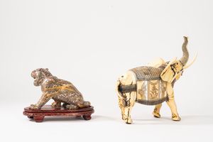 Lotto composto da una tigre in pietra dura ed un elefante in resina, secolo XX  - Asta Incanti d'Arte - Associazione Nazionale - Case d'Asta italiane