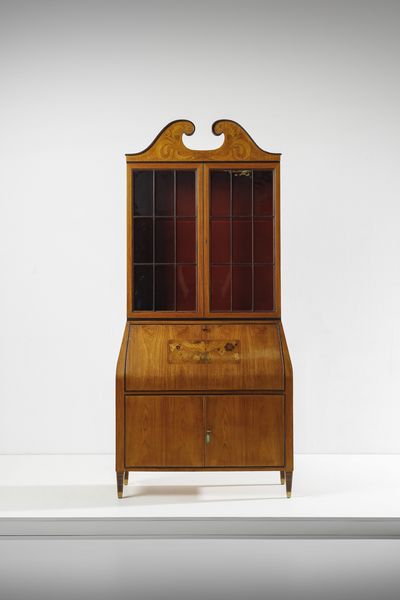 PAOLO BUFFA : Trumeau con base a due ante a battente, ribalta e alzata a vetrina terminante a cimasa, esecuzione Serafino Arrighi, Cant .  - Asta Asta 503 | DESIGN E ARTI DECORATIVE DEL NOVECENTO Virtuale - Associazione Nazionale - Case d'Asta italiane