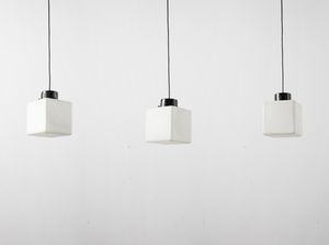 MANIFATTURA ITALIANA - Tre lampade a sospensione.